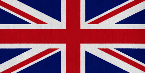 National flag of the United Kingdom on a cotton texture background