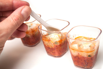 Closeup of mini appetizers in a little glasses