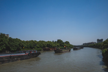 Fototapeta na wymiar Cargo ship in Grand Canal in Hangzhou, China