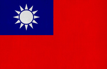 National flag of Taiwan on a cotton texture background