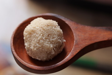 Close-up of coconut rava ladoos in a bowl