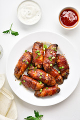 Bacon wrapped grilled chicken wings