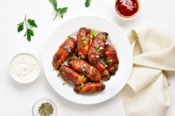Bacon wrapped grilled chicken wings