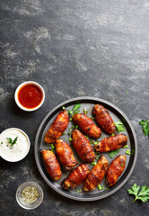 Bacon wrapped grilled chicken wings