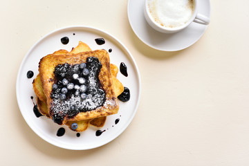 French toasts with blueberry sauce