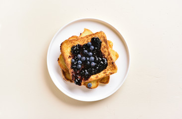 French toasts with blueberry sauce