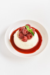 Panna cotta with fresh raspberries