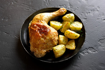 Baked chicken leg with potato