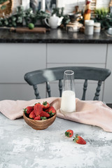 Wooden plate with strawberries