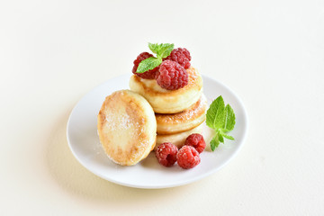 Cottage cheese pancakes with fresh raspberries