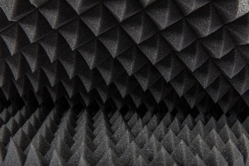 Close up of Sound Absorbing Sponge in Recording Studio. Dampening Acoustical Foam in Music Studio....