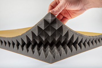 Close up of Sound Absorbing Sponge in Recording Studio. Dampening Acoustical Foam in Music Studio....
