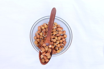 fresh germinated chickpeas on white background