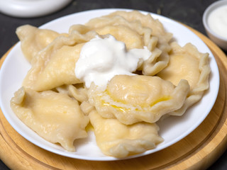 Dumplings with cottage cheese and sour cream.