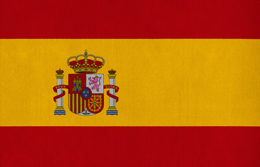 National flag of Spain on a cotton texture background