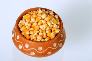 Close-up of Dried corn in clay pot