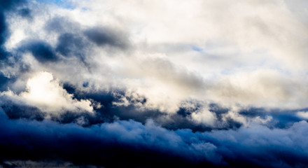 Fototapeta premium Dark and blue clouds short time before the thunderstorm begin