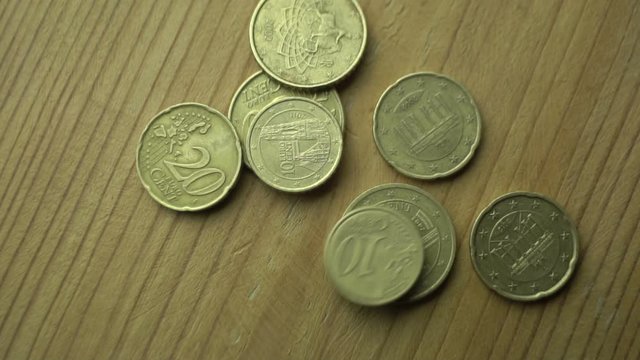 Close Up of Hands Counting Euro Cents