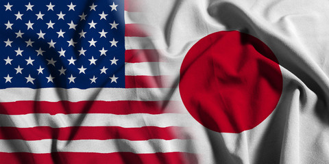 National flag of the United States with Japan on a waving cotton texture background