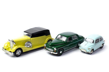 three toys retro cars isloated on white background