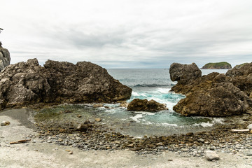 Fototapeta na wymiar Sea and rocks in Niijima island Japan