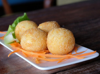 cheese ball in white plate