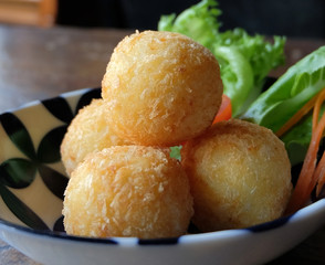 cheese ball in white plate