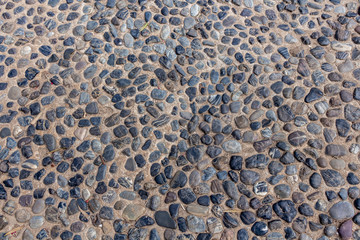 Beautiful texture of orange stone with holes is in the park