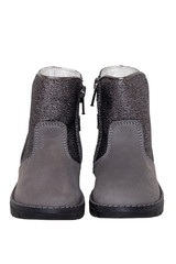 Winter boots. Close-up of a pair elegant gray silver leather winter boots lined with white leather. Girls winter shoe fashion new trends isolated on a white background. Macro photograph.