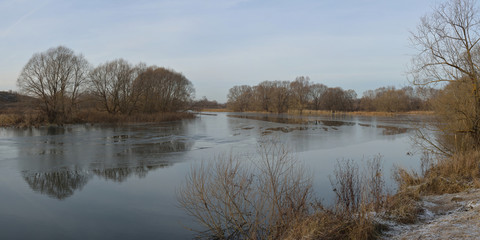Autumn fishing on the river. Beautiful panorama.
