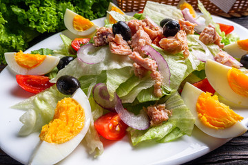tuna salad on dark wooden rustic background