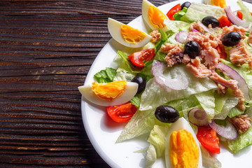 tuna salad on dark wooden rustic background