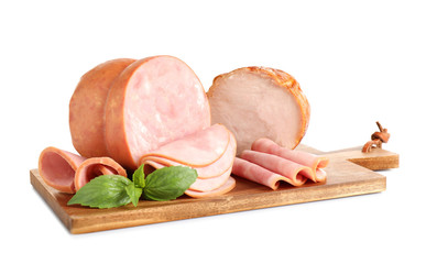 Tasty ham with basil on wooden board, white background © New Africa