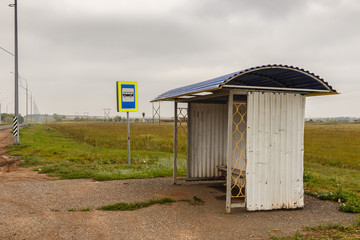 empty bus stop on the road, bus stop