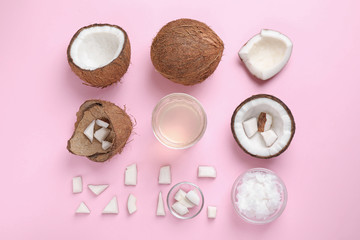 Flat lay composition with coconut oil on pink background