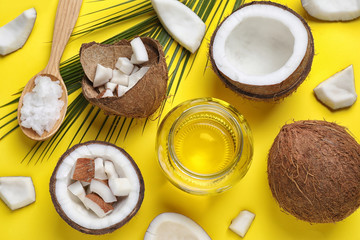 Flat lay composition with coconut oil on yellow background