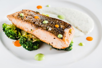 roasted salmon with vegetables and sauce