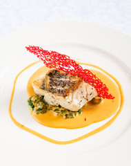 roasted cod with spinach and sauce