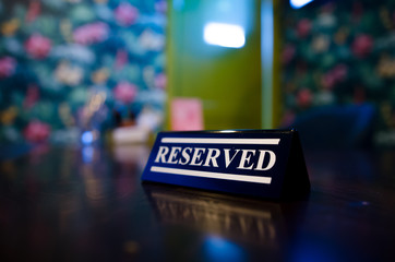 Table reservation sign close up. Ready for a party