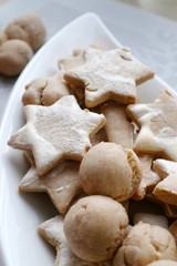 beked cookies in white plate on a dark grey slate