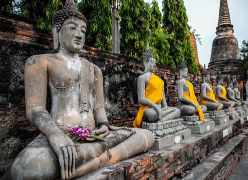  Buddha statues inside Wat Yai Chai Mongkhon, a Buddhist temple of archaeological park, Ayutthaya, Thailand