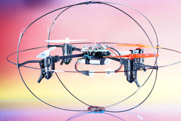Quadrocopter also called drone photographed in the studio and faked flight