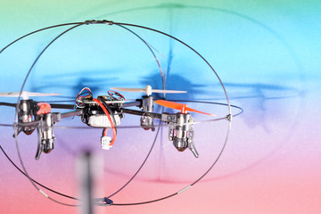 Quadrocopter also called drone photographed in the studio and faked flight