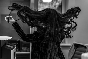 Girl dissolve her long hair