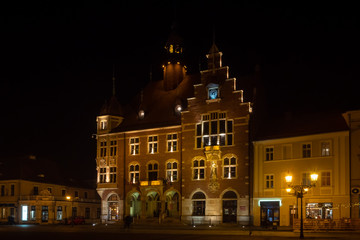Fototapeta na wymiar Poland Unesco city Tarnowskie Gory - market square with town hall and protestant church