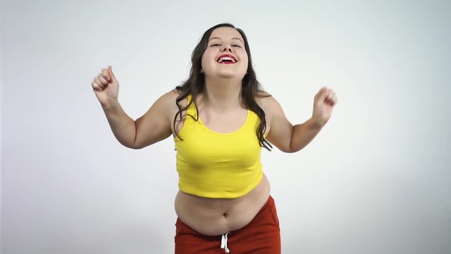 Crazy chubby girl preaches body positivity. Provocative dancing