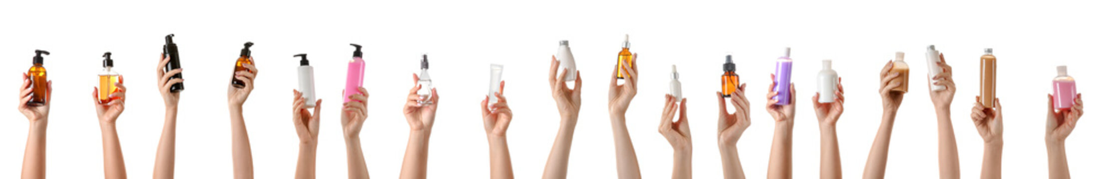 Female Hands With Different Cosmetic Products In Bottles On White Background
