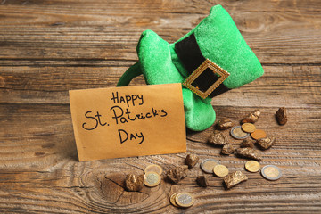 Composition for St. Patrick's Day on wooden background