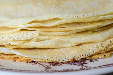 Delicate edges of thin Russian pancakes