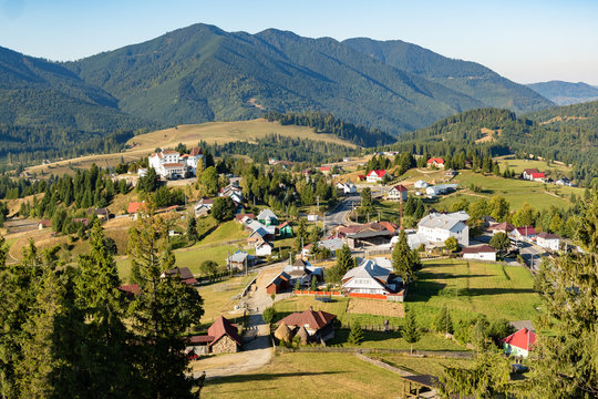 Beautiful fairytale landscape of Tihuta pass Village in North Romania during sunny autumn day